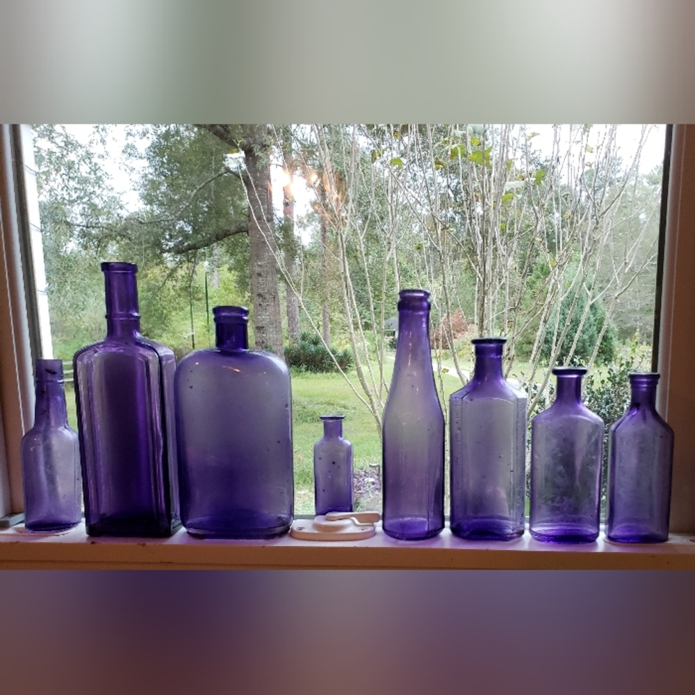 Collection of 8 Antique Purple bottles, pre'owned